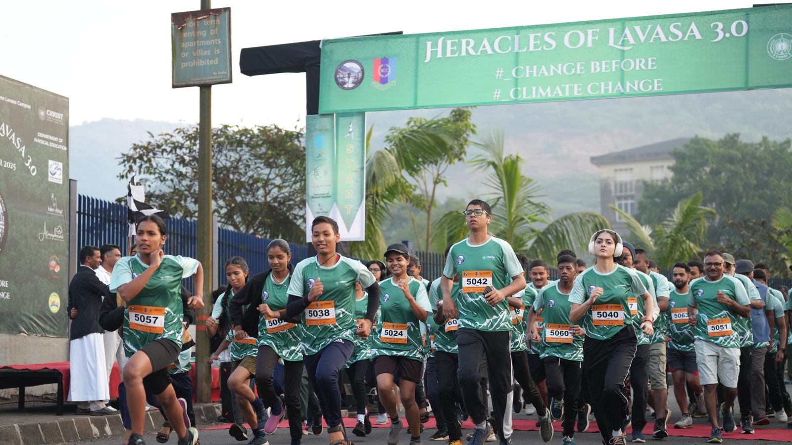 Runners setting off under the start arch at Heracles of Lavasa 3.0
