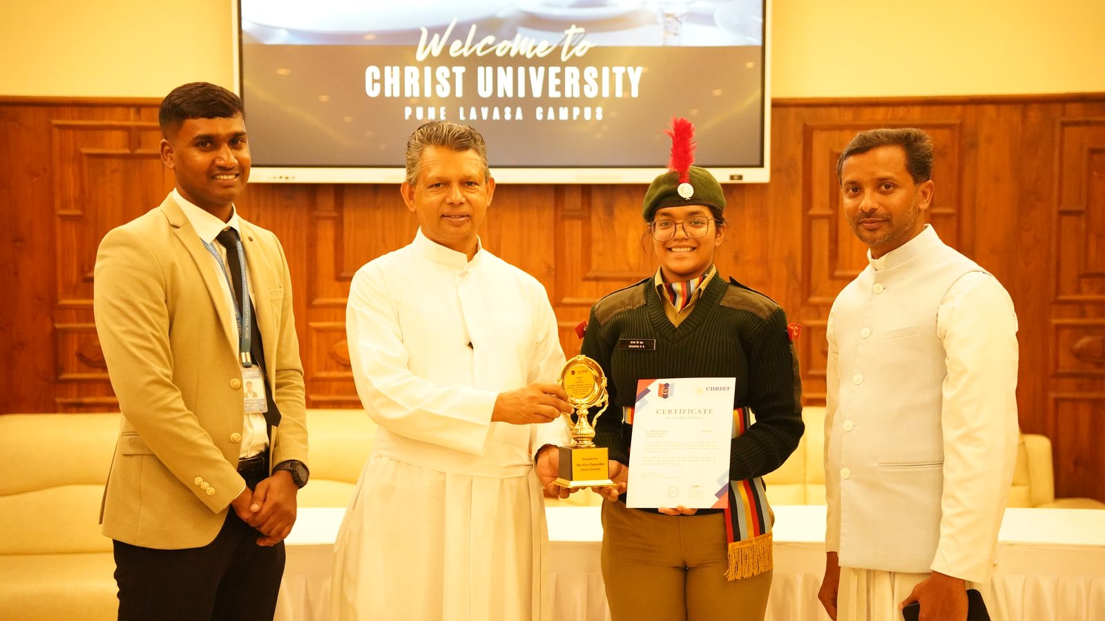 An NCC cadet receiving the commendation and appreciation award, CHRIST Pune Lavasa Campus