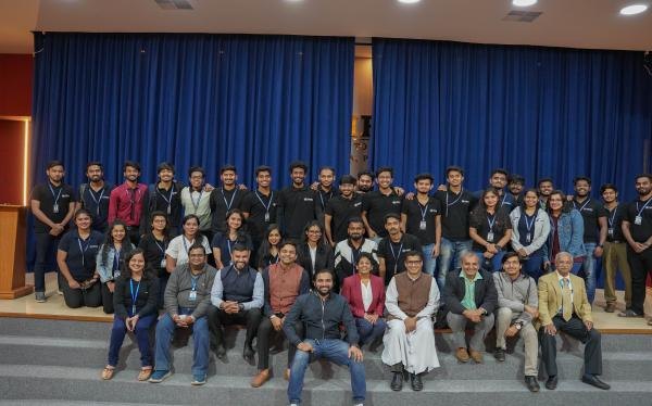 Alumni felicitated on stage at a Lavasa campus gathering