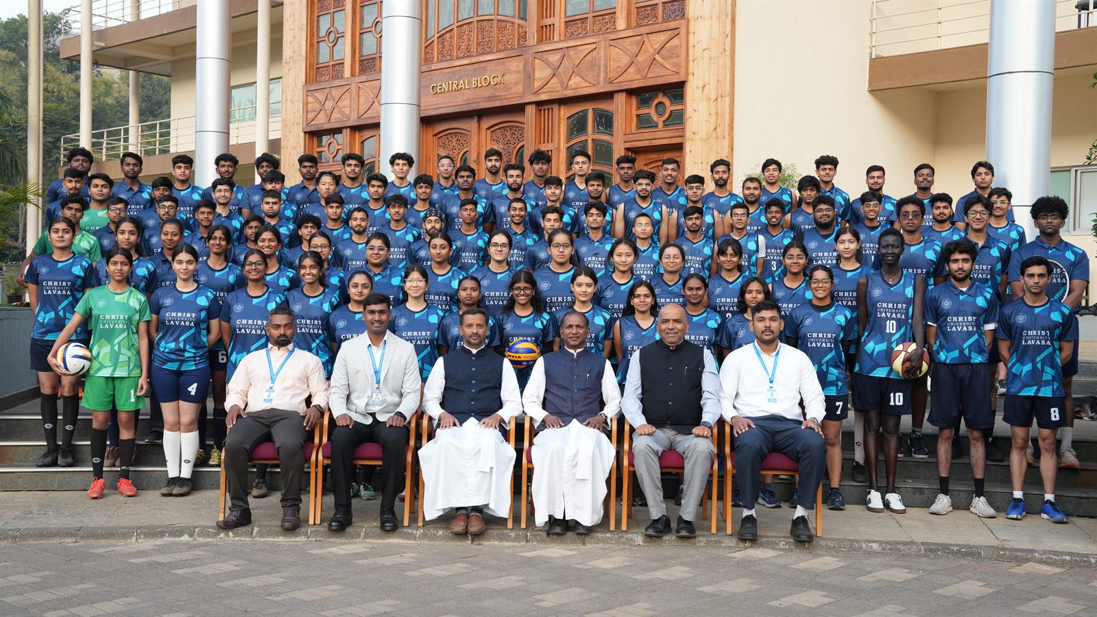 Student athletes training on the CHRIST Lavasa campus sports arena, set among the hills of the Western Ghats