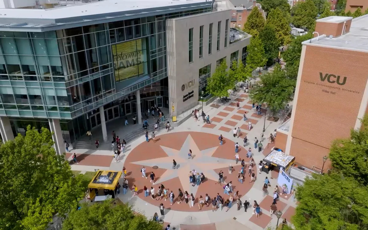 Students crossing the compass plaza at the centre of the Virginia Commonwealth University campus, USA