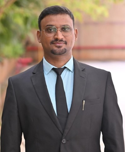 Dr. Viji B